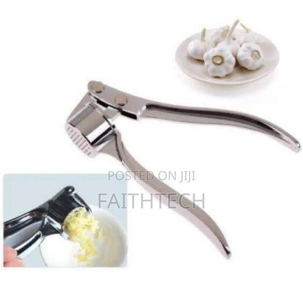 *Garlic Crusher*