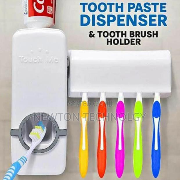 Toothpaste Dispenser 
And Toothbrush Holder