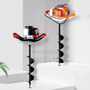 Quick-Drill Earth Auger Powered by Fuel-Efficient Motor - main view