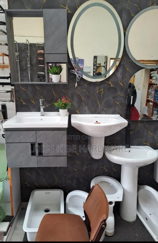 Cabinet and Mirror Available
