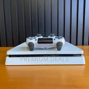 White Ps4 Slim With 10games Plus Original Controllers.