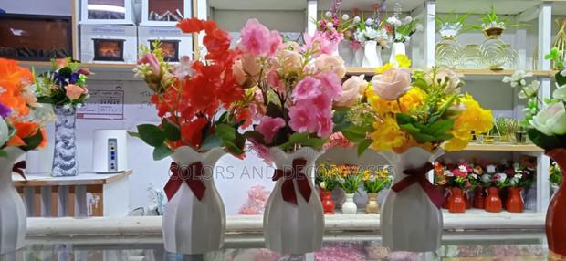 White Ribbon Vases And Flowers