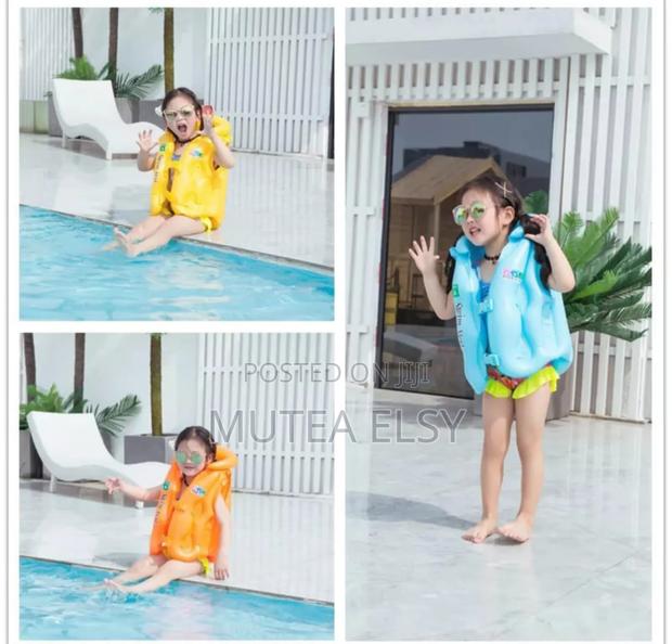 Yellow, Orange Blue Kids Life Jackets - main view