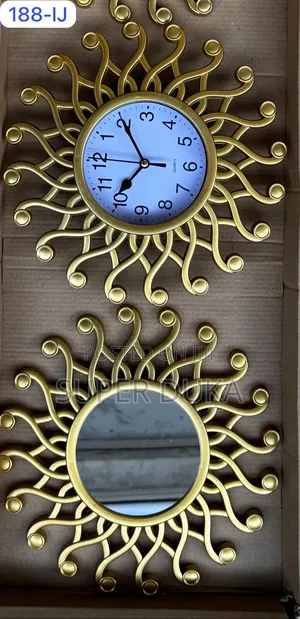 Wall Clock .A Metalic Wall Clock Decor With 2 Mirrors.