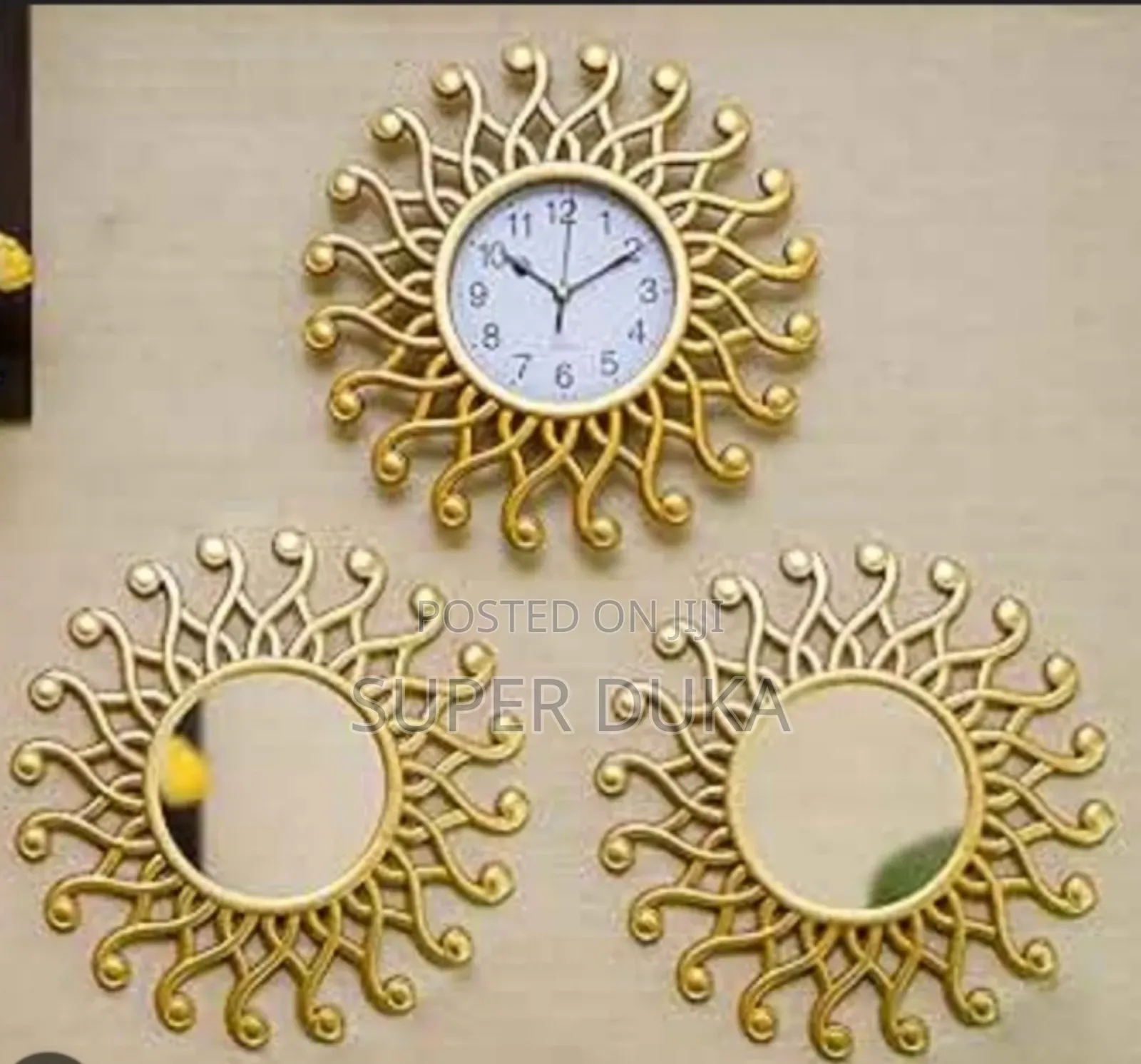 Wall Clock .A Metalic Wall Clock Decor With 2 Mirrors.