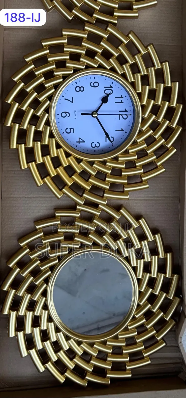 A Wall Clock Decoration Set and Two Matching Wall Mirrors