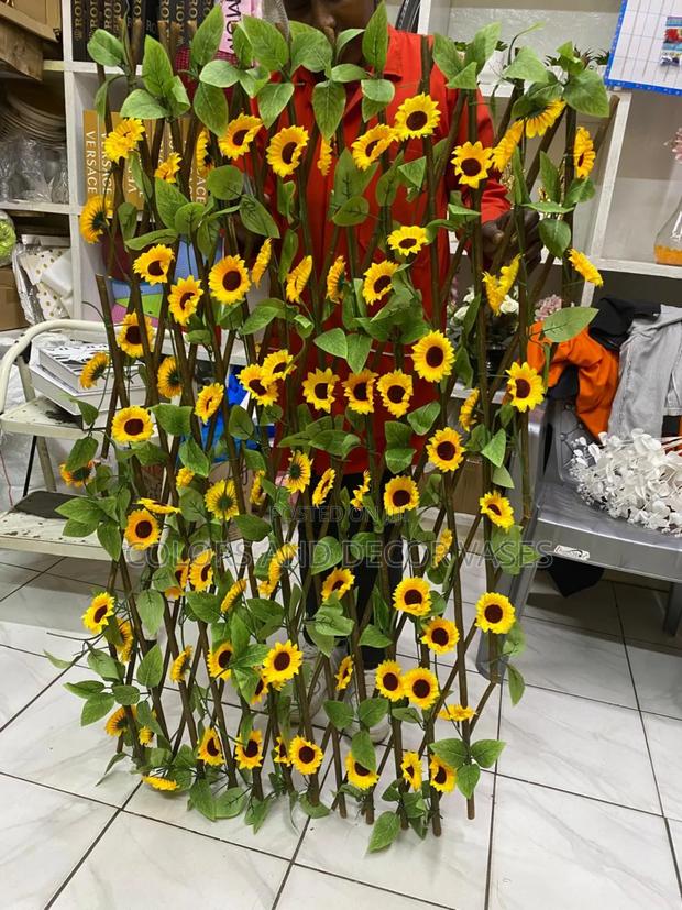 Fence With Artificial Sunflowers - main view