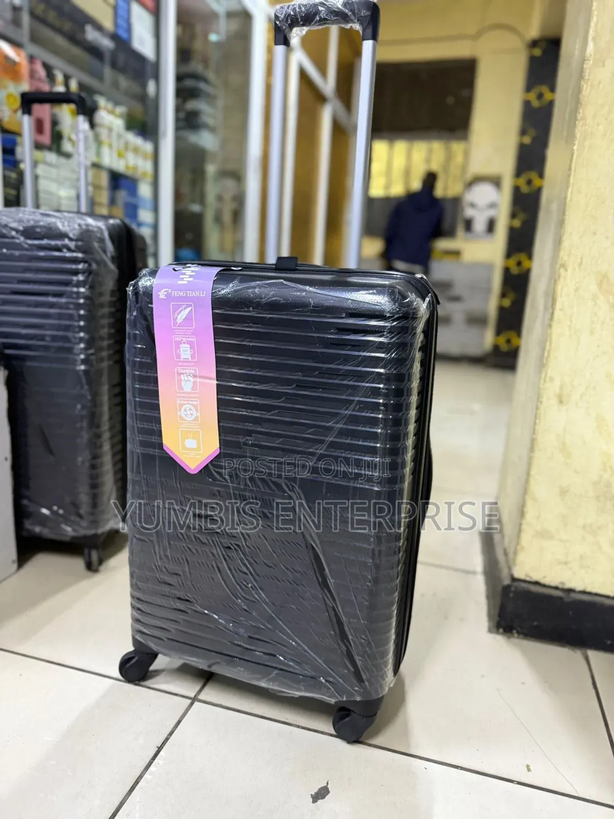 Black Medium Size Rubber Suitcase at 15-17kgs