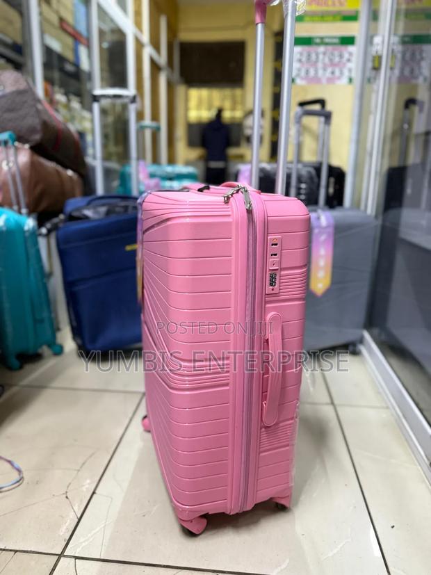 Medium Pink Suitcase (15-18kgs) - thumbnail 2