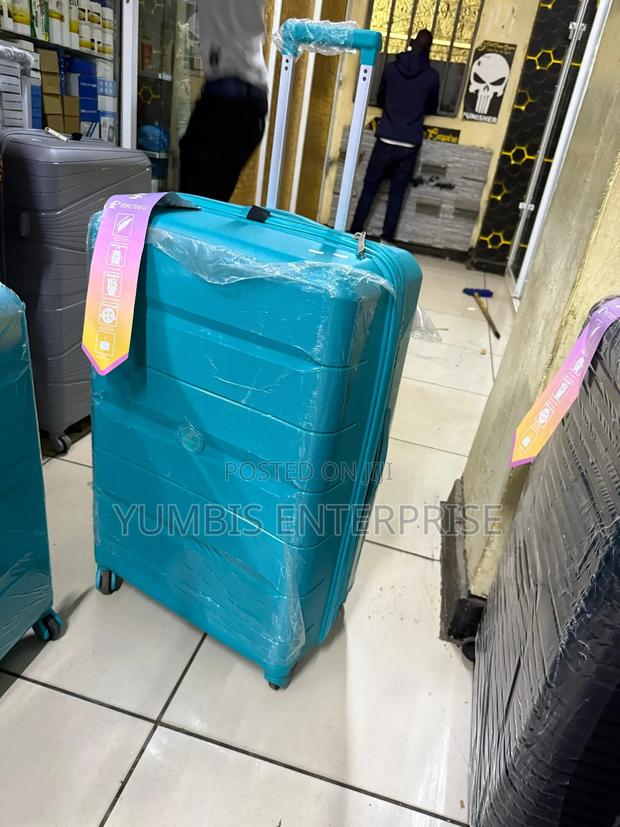 Large Green Rubber Suitcase for Sale Carry Upto 25kgs a