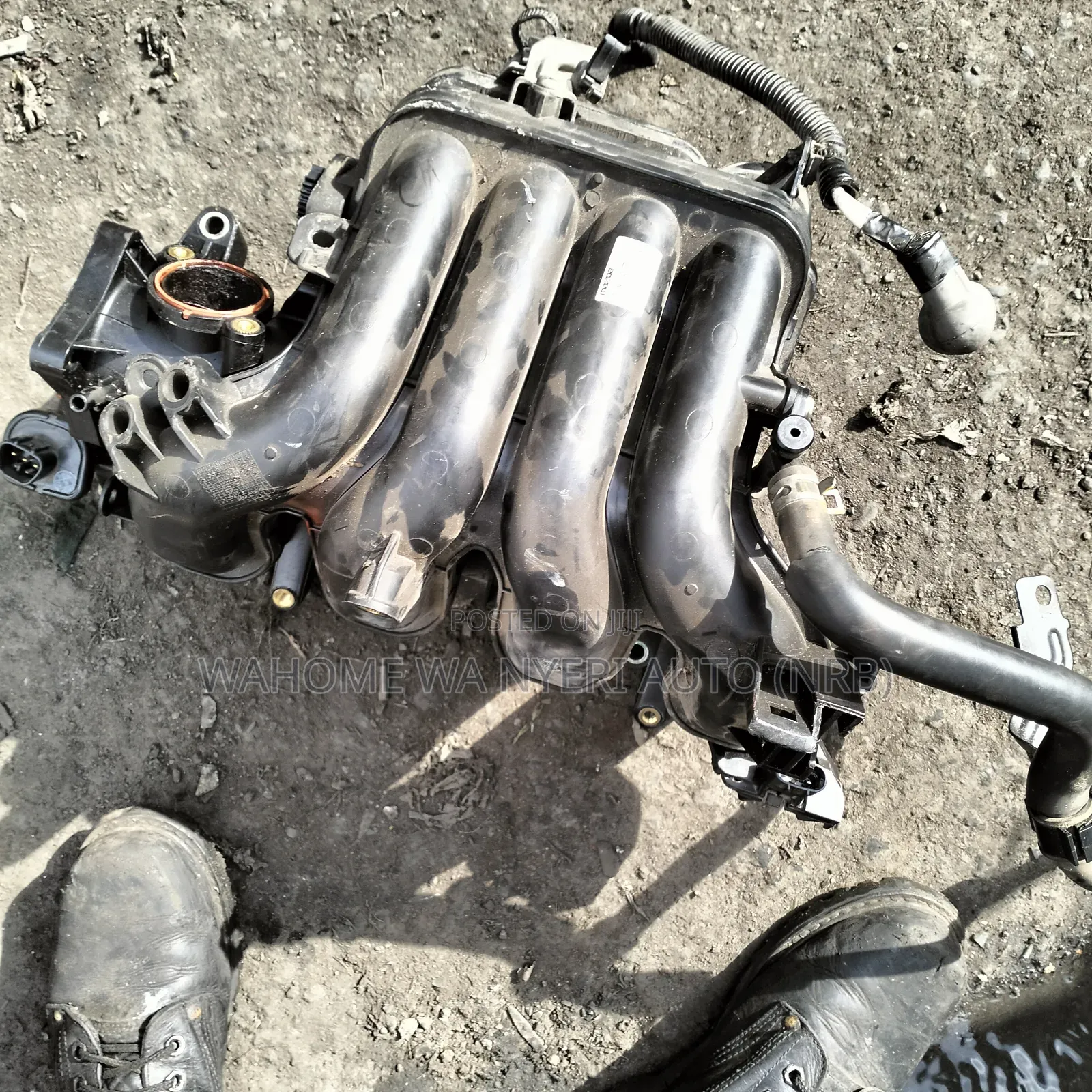 Manifold Mazda Demio Zj