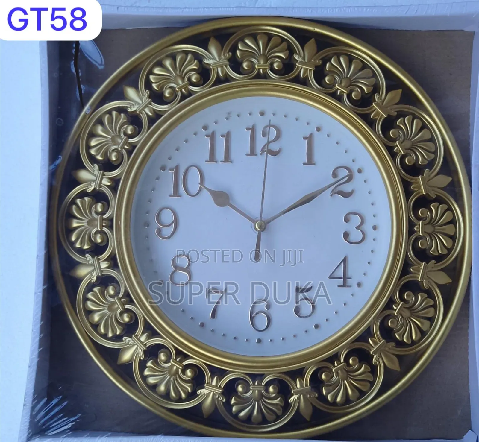 Decorative Wall Clock, Specifically a Gold Leaf Patterned.