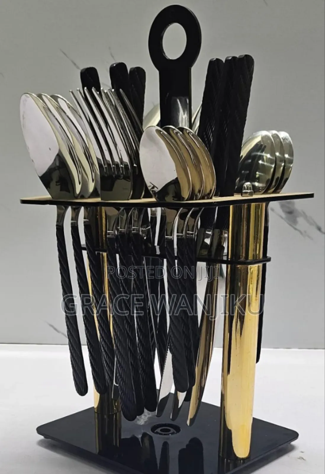 Heavy 24pc Cutlery Set With a Rotating Golden Stand