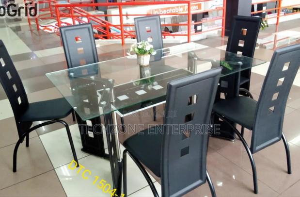 Executive 6 Sitter Glass Dinning Table With Leather Seat 