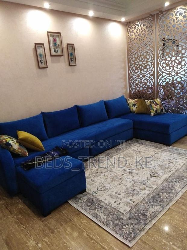 Blue Elegant 6 Seater L Seat With a Puff and Throw Pillows