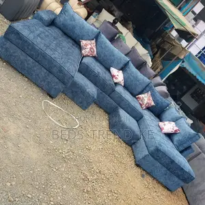 Classy 9 Seater U-Shaped Sofa Set With Puffs