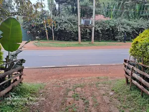 1 Acre Red Soil in Karen Windridge Touching Tarmac for Sale