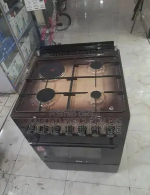 Brown Mika 60by60 Cooker. Electric Oven Electric Plate