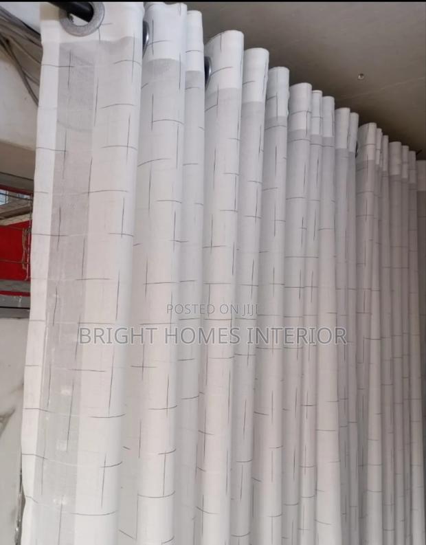 White Sheer With Grey Lines Matches Well With Grey Curtain