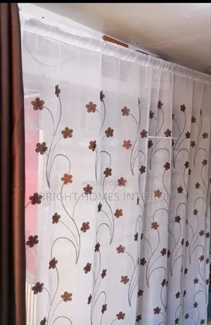 White Floral Sheer Matches Well With Brown Curtain