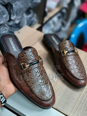 Timberland Mules
40-45
 Available