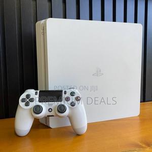 Ps4 Slim White as Snow With Games. - main view
