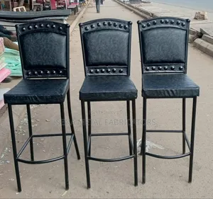 Black High Bar Stools With Studded Pattern.