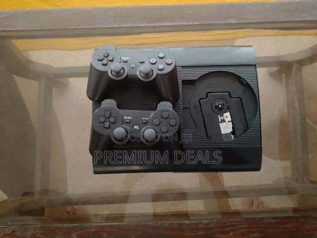 Chipped Ps3 Siperslim With 10 and Two Controllers. - main view