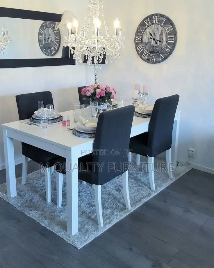 Black 4 Seater Dining Set With a White Table