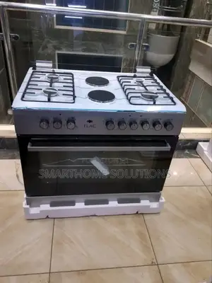 60 by 90 Standing Tlac Cooker With Oven, 4gas +1 E Plate .