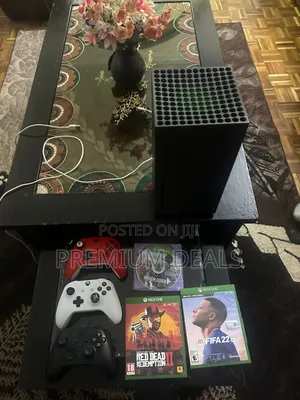Xbox Series X With Games and Controllers.