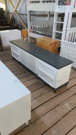 Quality Tv Stand Wit a Black Tabletop