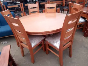 Brown 6 Seater Round Tabled Dining Set