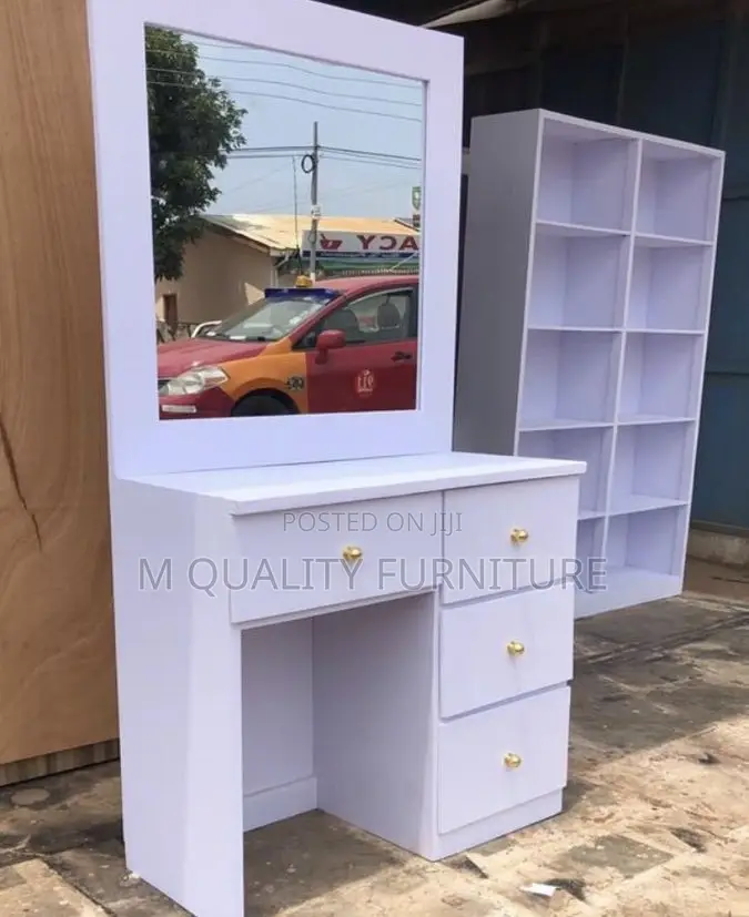 White 4 Drawers With a Mirror