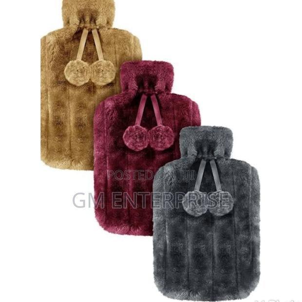 Hot Water Bottle With Fur Fleece Cover* 2 Litres .