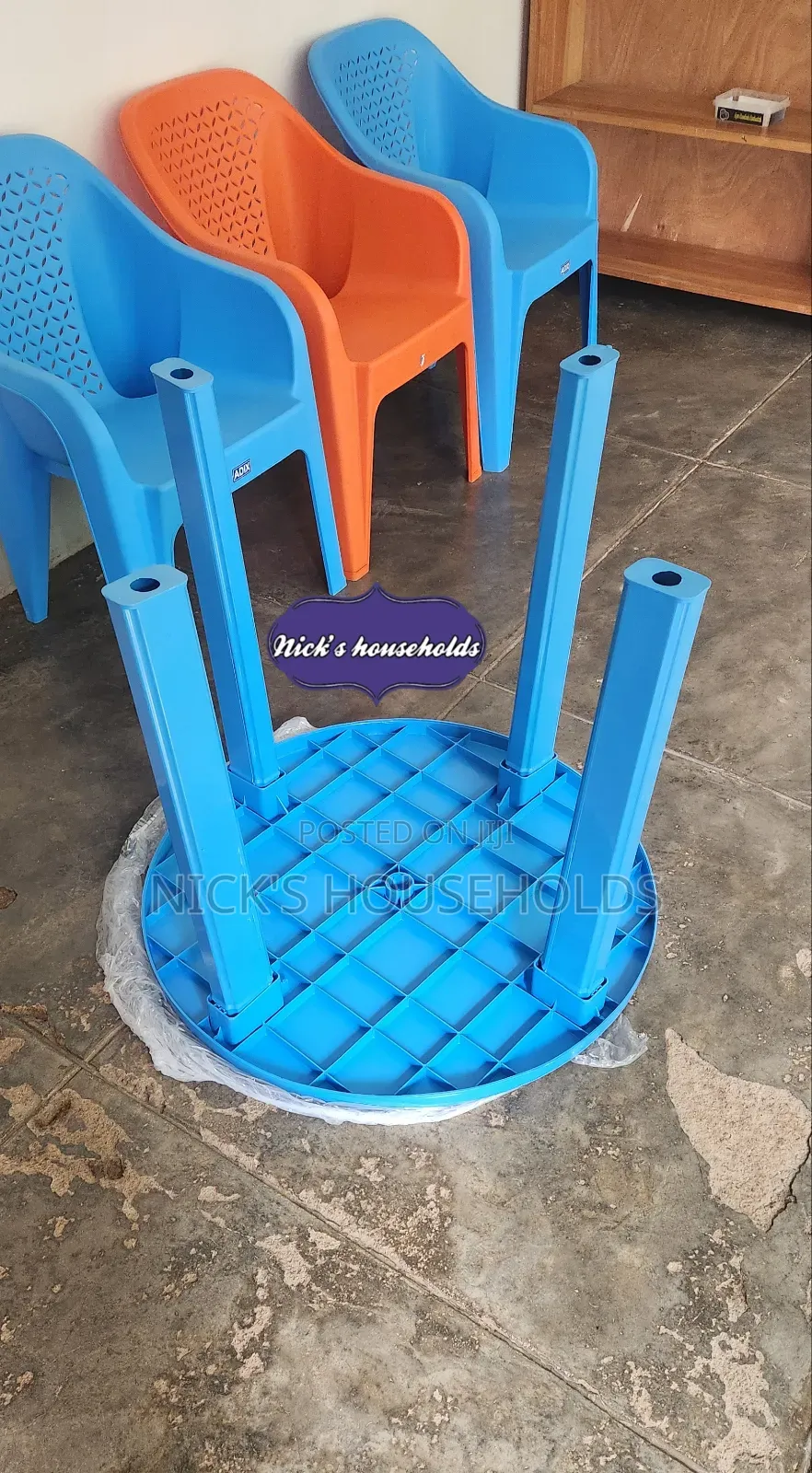 Plastic Chair (Easy Chairs) and a Round Plastic Table