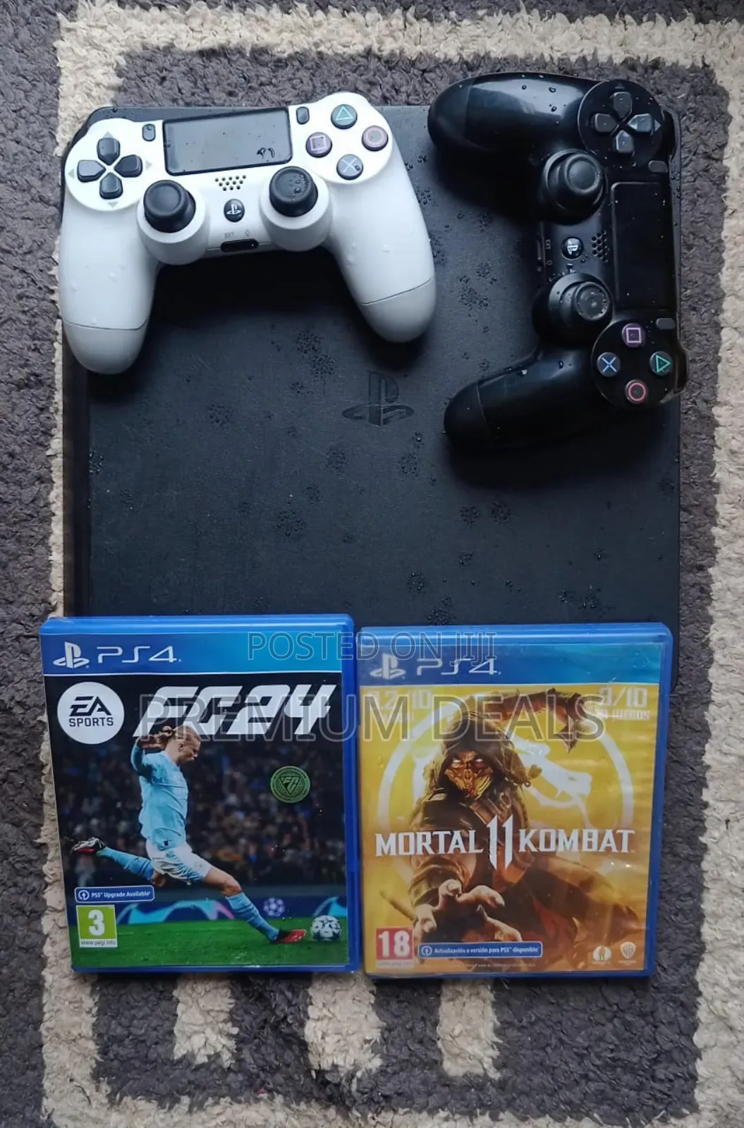 Ps4 Slim With Two Controllers Plus Two Games.