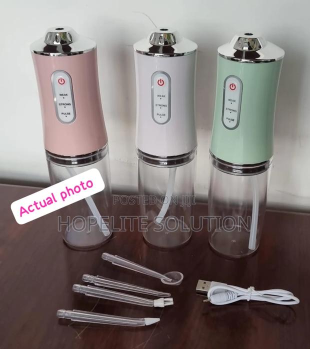 Rechargeable Portable Oral Irrigator With 4 Nozzles - thumbnail 5