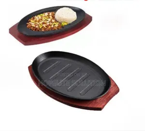 Cast Iron Hot Sizzling Plate on Wooden Tray