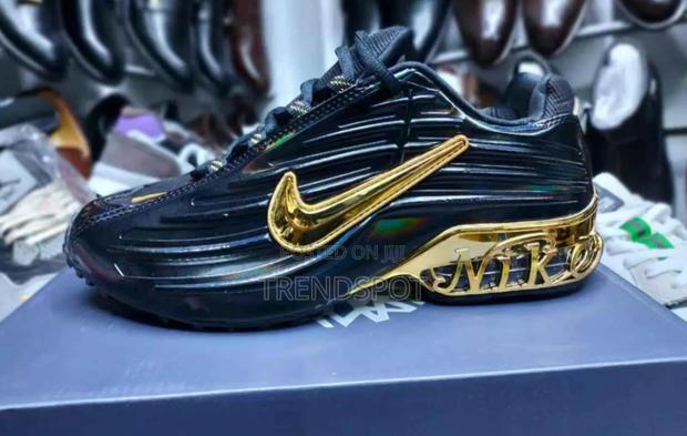 Nike Kioo Black Tick Gold