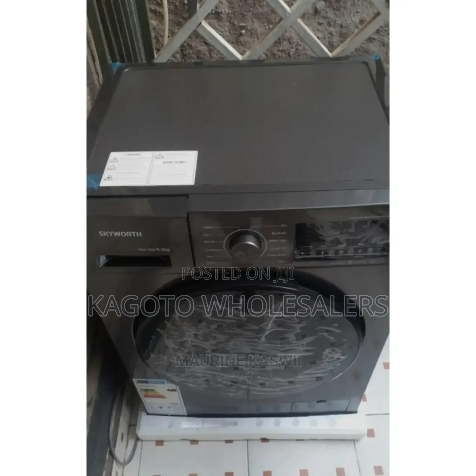 Black Skyworth 8kg Front Load Washing Machine.