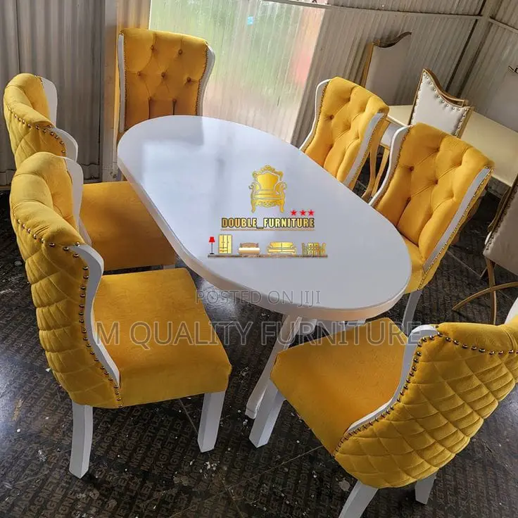 Yellow 6 Seater Dining Sets With a White Table