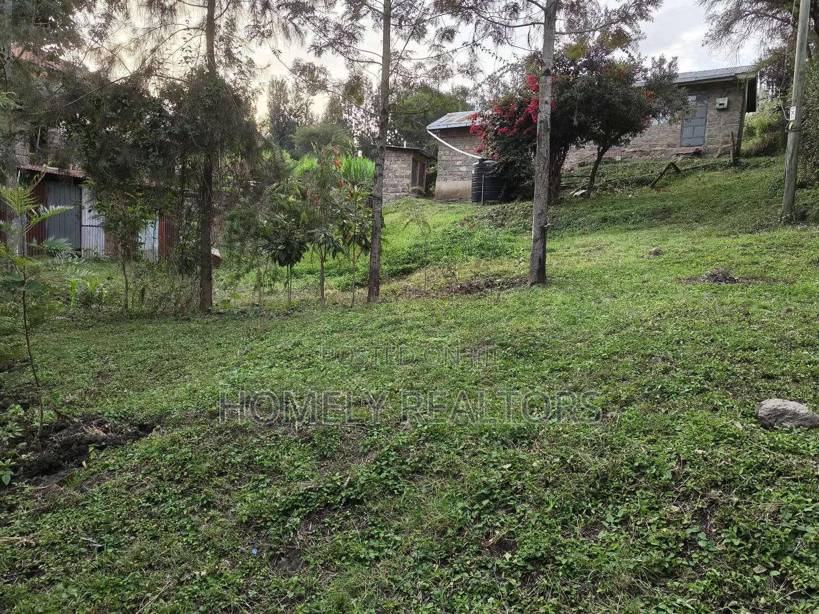 Quarter Acre Gated Corner Plot in Rimpa, Rongai With a House