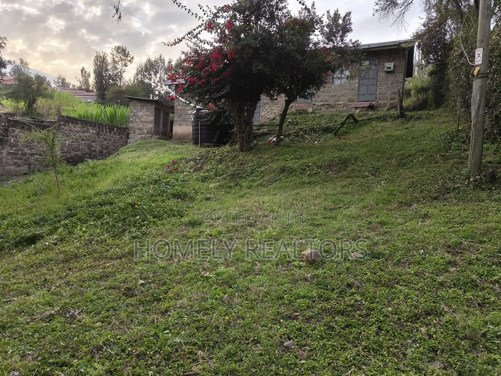 Quarter Acre Gated Corner Plot in Rimpa, Rongai With a House