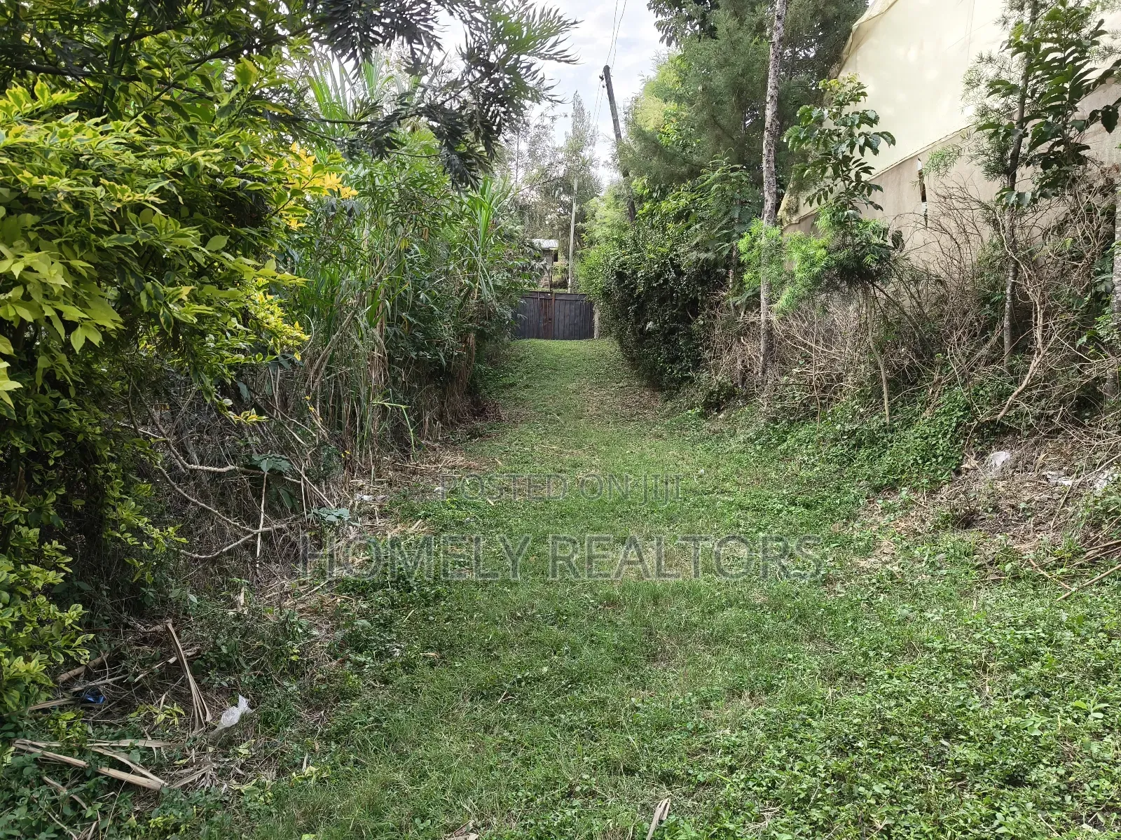 Quarter Acre Gated Corner Plot in Rimpa, Rongai With a House