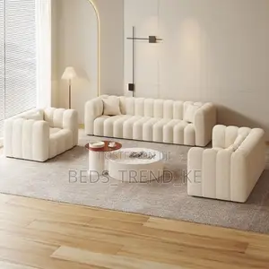Sleek White 5 Seater Modern Sofa Set With a Puff