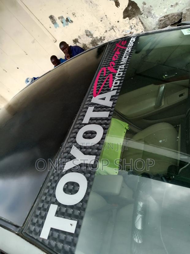 Toyota Car Windscreen Fitted With Branded Sport Stickers - main view