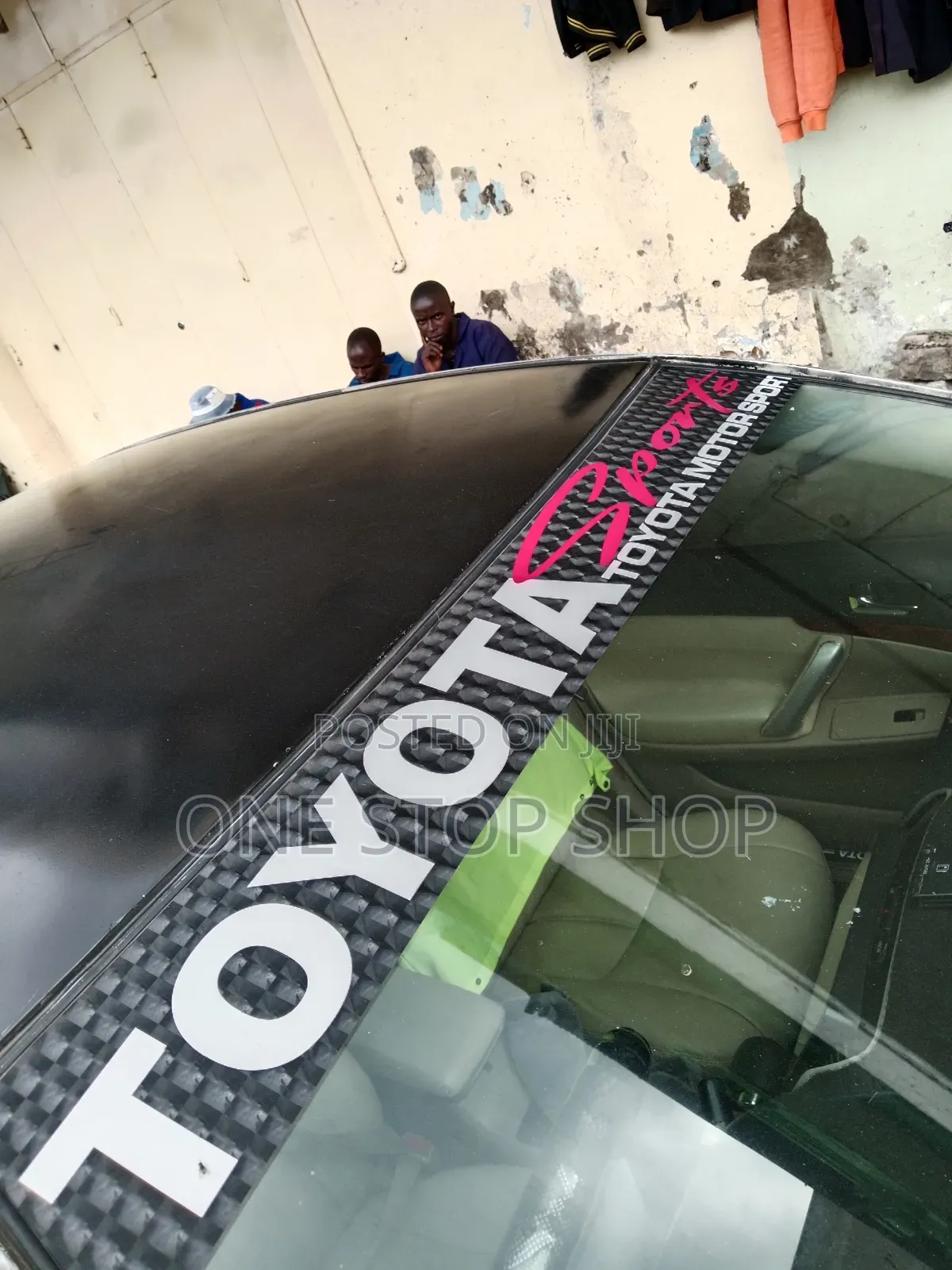 Toyota Car Windscreen Fitted With Branded Sport Stickers