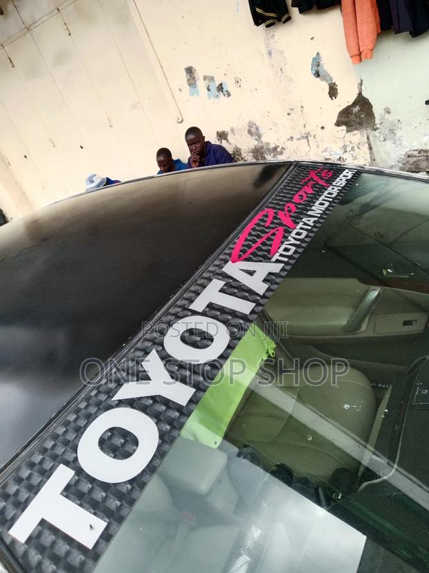 Toyota Car Windscreen Fitted With Branded Sport Stickers - thumbnail 2