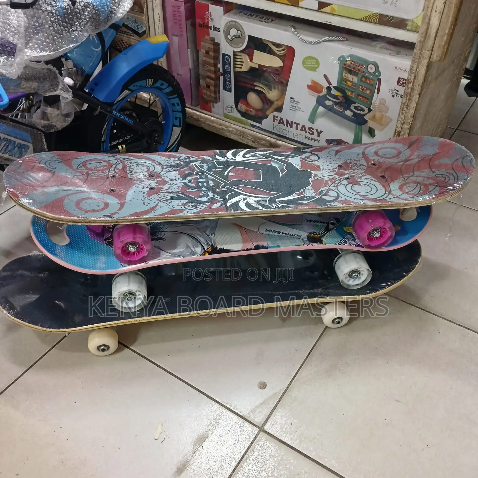White, Red Wheeled Skate Boards With Grip Tapes